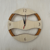 Beige wavy wall clock
