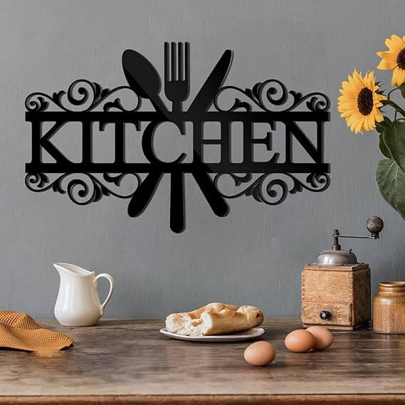 Kitchen word with utensils wall decor 