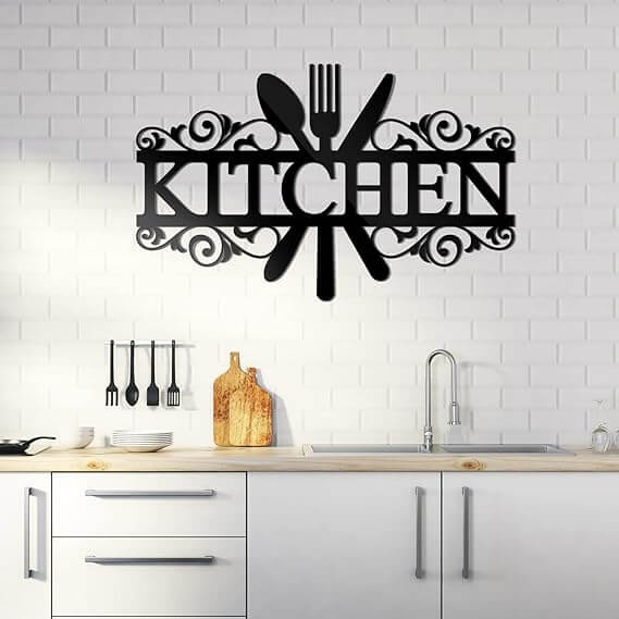Kitchen word with utensils wall decor 